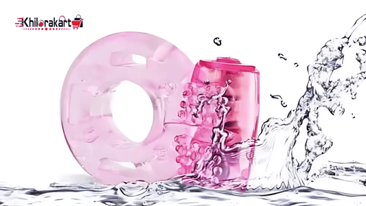 Pink waterproof vibrator silicone ring with textured stimulator, splashing water design, showcased on KhiloraKart.